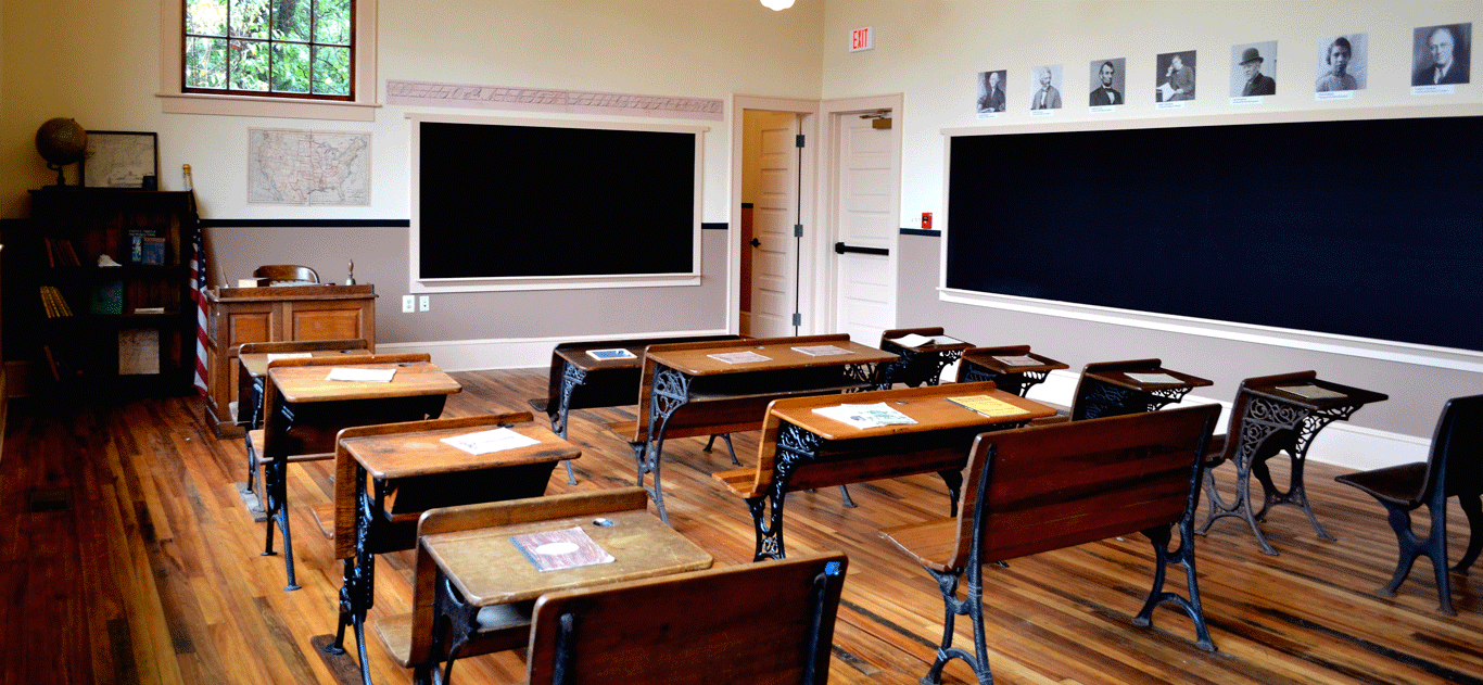 empty classroom with blank blackboards
